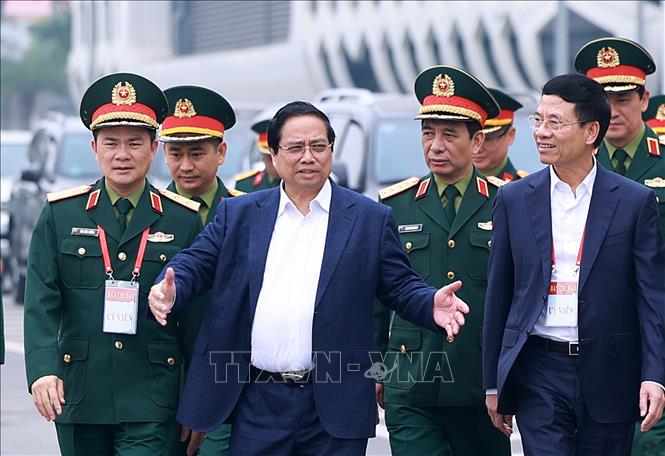 Thủ tướng Phạm Minh Chính làm việc với Bộ Quốc phòng và các bộ, ngành về kết quả hoạt động nghiên cứu, sản xuất, phát triển công nghiệp quốc phòng. Ảnh: Dương Giang-TTXVN 
