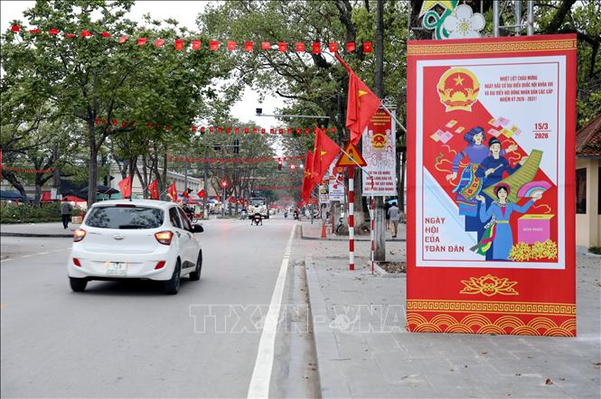 Thông điệp về Ngày hội bầu cử được treo khắp nơi để toàn dân hiểu và thực hiện quyền lợi, trách nhiệm của công dân. Ảnh: Văn Đạt - TTXVN