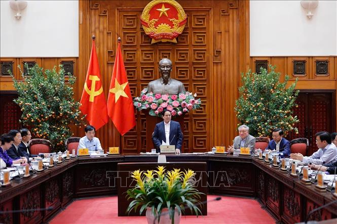 Thủ tướng Phạm Minh Chính chủ trì cuộc làm việc của Thường trực Chính phủ với lãnh đạo thành phố Hà Nội về Quy hoạch tổng thể Thủ đô Hà Nội tầm nhìn 100 năm. Ảnh: Dương Giang - TTXVN 