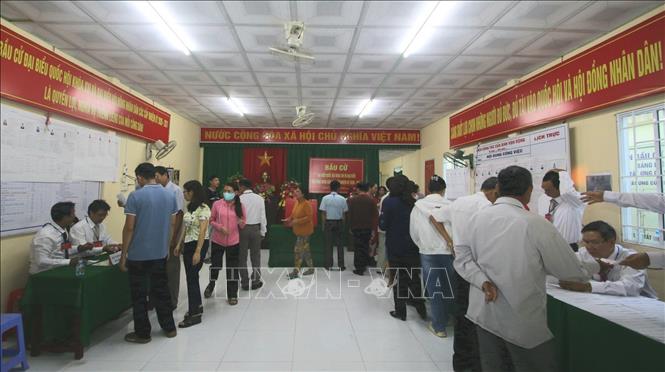 Cử tri đi bầu cử tại điểm bỏ phiếu số 4, phường Vị Tân, thành phố Cần Thơ. Ảnh: Duy Khương - TTXVN

