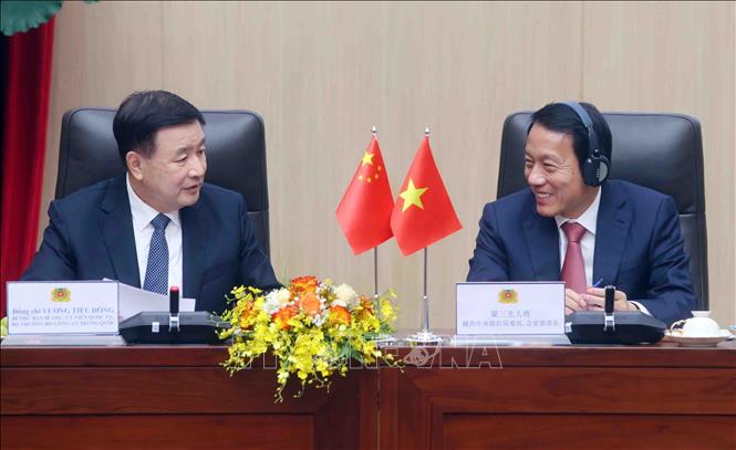 Vietnamese Minister of Public Security Gen. Luong Tam Quang and his Chinese counterpart Wang Xiaohong co-chair the conference. VNA Photo: Phạm Kiên 