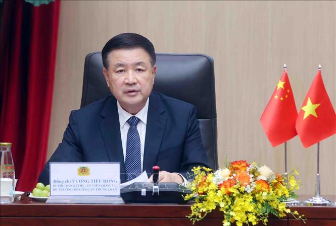 Chinese Minister of Public Security Wang Xiaohong speaks at the conference. VNA Photo: Phạm Kiên 