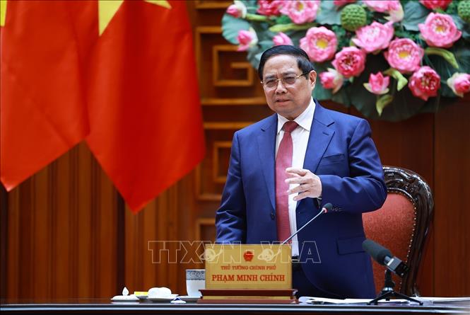 Thủ tướng Phạm Minh Chính chủ trì họp Tổ công tác bảo đảm an ninh năng lượng trước diễn biến phức tạp của cuộc xung đột quân sự tại Trung Đông. Ảnh: Dương Giang-TTXVN 
