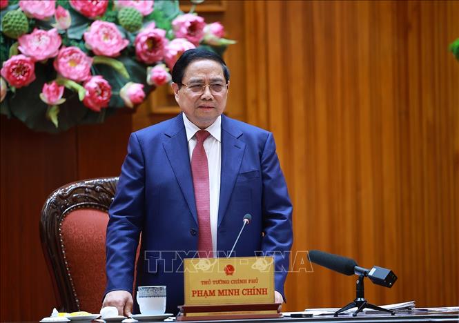 Thủ tướng Phạm Minh Chính chủ trì họp Tổ công tác bảo đảm an ninh năng lượng trước diễn biến phức tạp của cuộc xung đột quân sự tại Trung Đông. Ảnh: Dương Giang-TTXVN 
