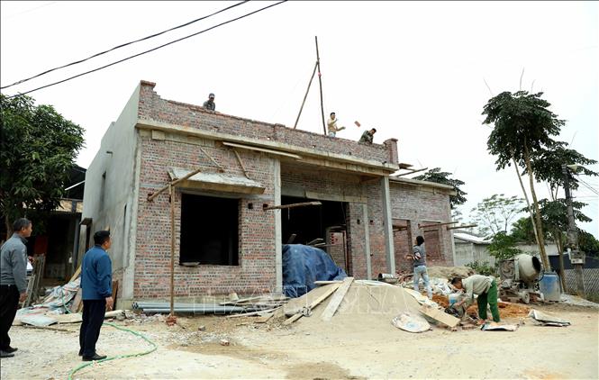 Đời sống của người dân xã Đông Thọ ngày càng được cải thiện . Ảnh: Quang Cường – TTXVN.