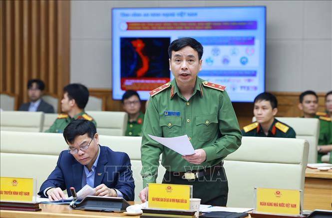 Trung tướng Lê Xuân Minh, Cục trưởng Cục An ninh mạng và phòng, chống tội phạm sử dụng công nghệ cao báo cáo tình hình an ninh mạng quốc gia. Ảnh: Dương Giang-TTXVN