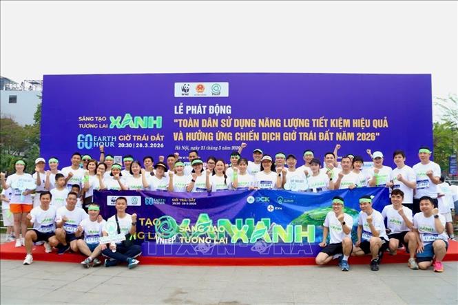 Các VĐV check-in trước giờ chạy. Ảnh: Lan Anh/TTXVN phát