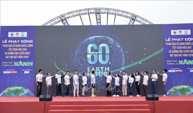 Các đại biểu thực hiện nghi thức phát động. Ảnh: Trần Việt - TTXVN 