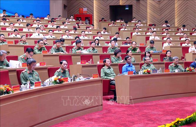 Đại tướng Lương Tam Quang, Bộ trưởng Bộ Công an và các đại biểu tham dự buổi lễ. Ảnh: Phạm Kiên - TTXVN