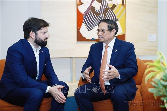  Nhân dịp tham dự Hội nghị Thượng đỉnh nhóm các nền kinh tế mới nổi (BRICS) mở rộng năm 2025 tại thành phố Rio de Janeiro, chiều 7/7/2025, Thủ tướng Phạm Minh Chính gặp Tổng thống Chile Gabriel Boric. Ảnh: Dương Giang-TTXVN