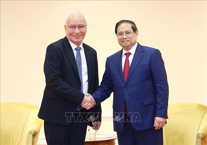 Thủ tướng Phạm Minh Chính tiếp đại diện lãnh đạo Tập đoàn TH True Milk của Việt Nam đang đầu tư tại Liên bang Nga. Ảnh: Dương Giang-TTXVN 
