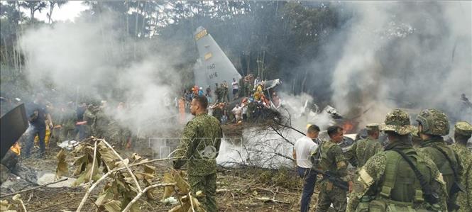 Binh sĩ Colombia làm nhiệm vụ tại hiện trường vụ rơi máy bay vận tải quân sự ở Puerto Leguizamo, Putumayo, Colombia ngày 23/3/2026. Ảnh: REUTERS/TTXVN