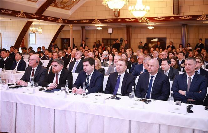 Delegates attend the forum. VNA Photo: Dương Giang 