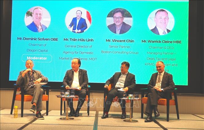 Phiên thảo luận với chủ đề phát triển thị trường hàng hoá phái sinh trong Trung tâm Tài chính quốc tế. Ảnh: Hứa Chung - TTXVN