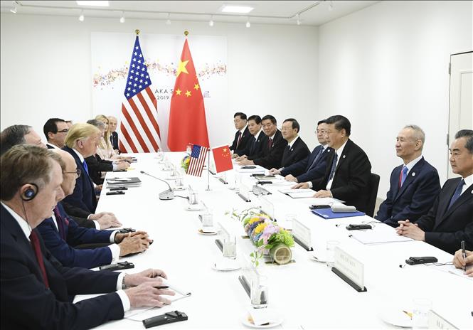 (Tư liệu) Tổng thống Mỹ Donald Trump và Chủ tịch Trung Quốc Tập Cận Bình tại cuộc gặp ở Osaka, Nhật Bản, ngày 29/6/2019. Ảnh: THX/TTXVN