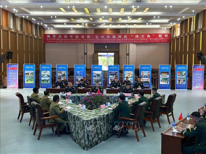 Quang cảnh buổi Lễ khởi động “Cơ chế hợp tác thực thi pháp luật khu vực Tam giác xanh và vùng biên giới tiếp giáp Trung Quốc - Lào - Việt Nam. Ảnh: TTXVN phát