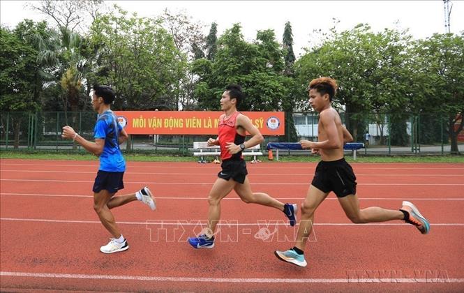 Thể thao Việt Nam đang trải qua bước chuyển mình mạnh mẽ từ các sân tập đơn sơ sang cơ sở hạ tầng hiện đại. Trong ảnh:  Các vận động viên tích cực tập luyện sau thời gian nghỉ Tết Nguyên đán Tân Sửu 2021. Ảnh: TTXVN

