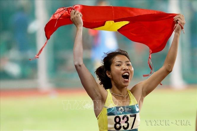 VĐV nhảy xa Bùi Thu Thảo giành HCV tại Giải vô địch điền kinh Châu Á 2017 và Đại hội Thể thao châu Á 2018 ở Indonesia; HCB tại Đại hội Thể thao châu Á 17 ở Incheon, Hàn Quốc (2014). Ảnh: TTXVN
