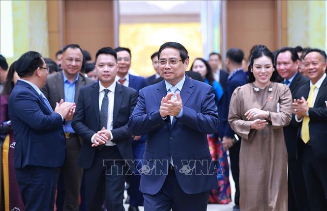 Thủ tướng Phạm Minh Chính đến dự Hội nghị Doanh nghiệp góp phần vào tăng trưởng hai con số và Thủ tướng Chính phủ tri ân doanh nghiệp. Ảnh: Dương Giang-TTXVN
