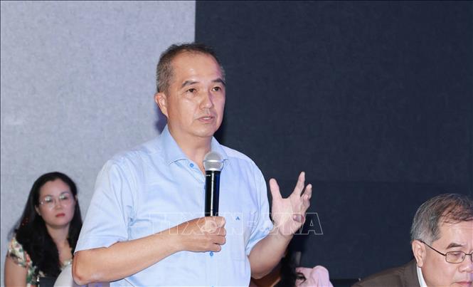 Chuyên gia góp ý tại hội thảo. Ảnh: Thu Hoài - TTXVN