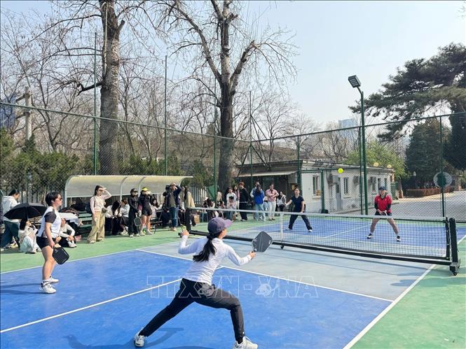 Cuộc tranh tài giữa các đôi nữ tham dự giải. Ảnh: Quang Hưng - PV TTXVN tại Trung Quốc