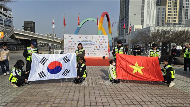 Quang cảnh nghi thức chào cờ tại lễ khai mạc.Ảnh: Đức Thắng (P/v TTXVN tại Hàn Quốc). Ảnh: Đức Thắng - PV TTXVN tại Hàn Quốc