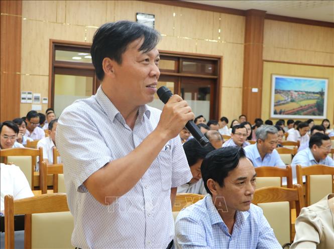 Đại biểu tham gia thảo luận, góp ý các nghị quyết tại hội nghị. Ảnh: Đinh Hương - TTXVN