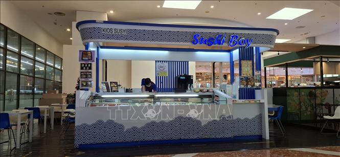 Một quầy bán đồ ăn trong giờ vắng khách tại Kuala Lumpur. Ảnh: Bùi Hoàn-PV TTXVN tại Malaysia
