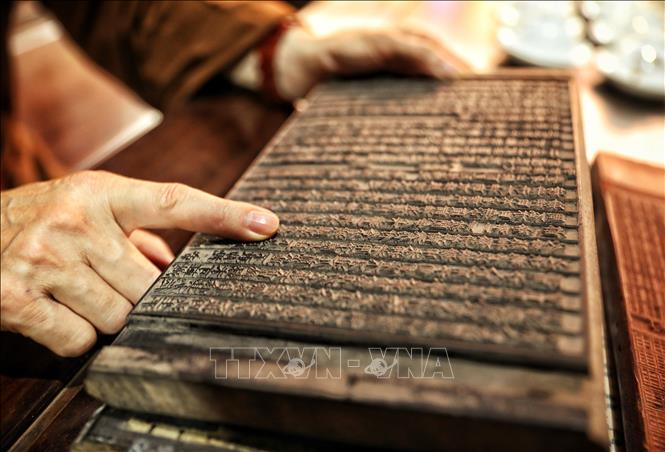 A woodblock carved in both Han and Nom scripts with remarkable craftsmanship is still intact. VNA Photo: Danh Lam