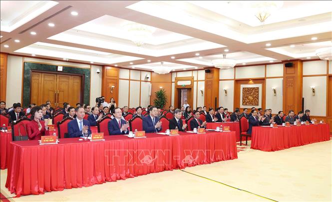 Các đại biểu tham dự Hội nghị công bố Quyết định của Bộ Chính trị về công tác tổ chức và cán bộ. Ảnh: Phương Hoa - TTXVN