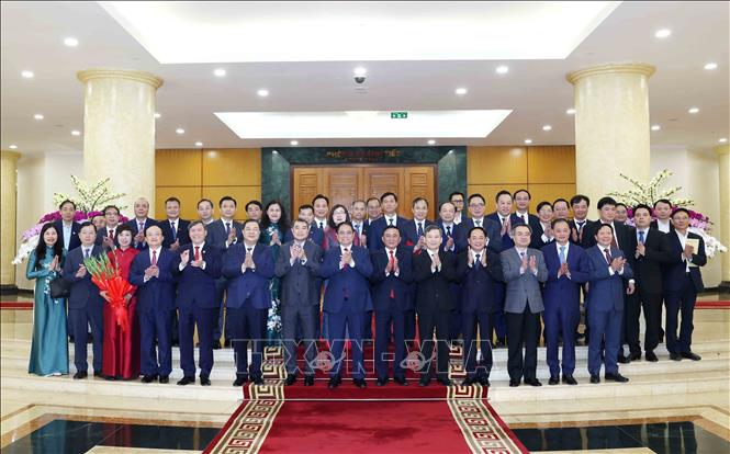 Thường trực Ban Bí thư Trần Cẩm Tú, Thủ tướng Phạm Minh Chính cùng các đồng chí lãnh đạo Đảng, Nhà nước chụp ảnh chung với Ban lãnh đạo 5 cơ quan: Đài Truyền hình Việt Nam, Đài Tiếng nói Việt Nam, Thông tấn xã Việt Nam, Viện Hàn lâm Khoa học xã hội Việt Nam, Viện Hàn lâm Khoa học và Công nghệ Việt Nam. Ảnh: Phương Hoa - TTXVN
