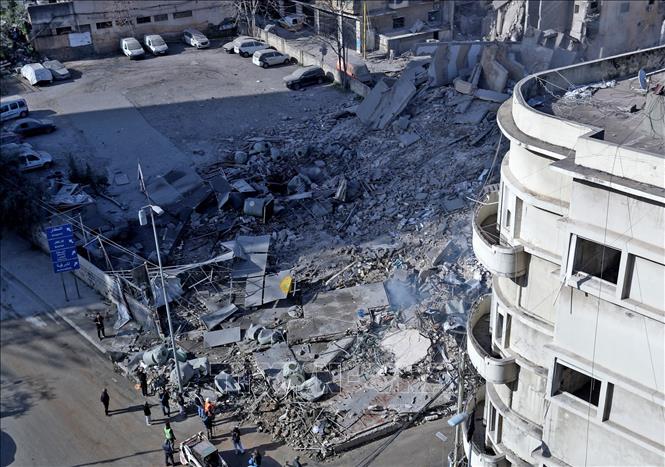 Hiện trường cuộc oanh kích của Israel xuống ngoại ô thủ đô Beirut, Liban. Ảnh: THX/TTXVN