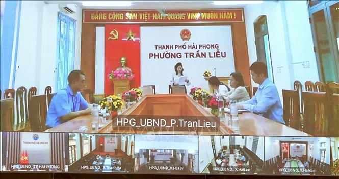 Phiên họp được kết nối trực tuyến tới các điểm cầu xã, phường, đặc khu trên toàn địa bàn. Ảnh: Minh Huệ-TTXVN