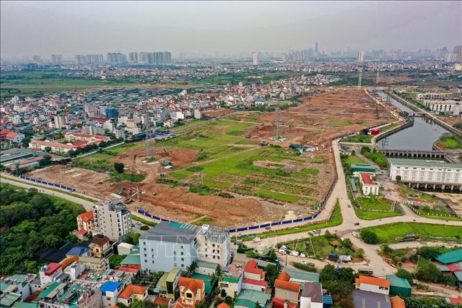 Toàn cảnh công trường hồ điều hòa Yên Nghĩa 1 đang được đẩy nhanh tiến độ. Ảnh: Trung Nguyên - TTXVN