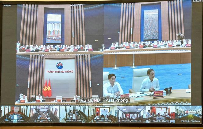 Hội nghị được kết nối trực tuyến tới các điểm cầu xã, phường, đặc khu trên toàn địa bàn. Ảnh: Minh Huệ-TTXVN
