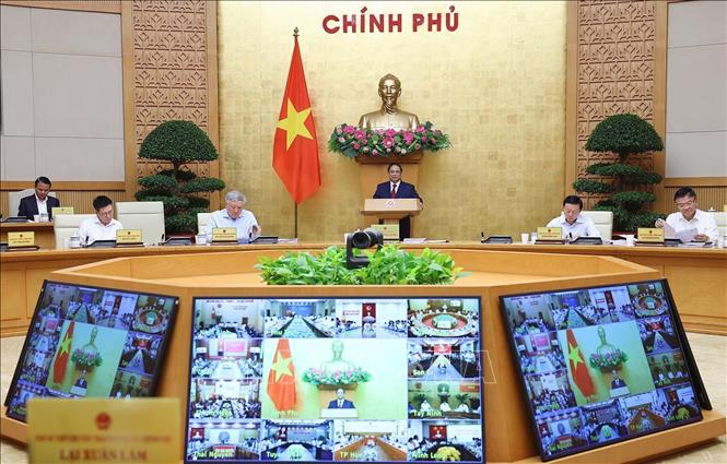 Thủ tướng Phạm Minh Chính chủ trì Phiên họp Chính phủ thường kỳ tháng 3 năm 2026 và Hội nghị Chính phủ trực tuyến với địa phương. Ảnh: Dương Giang-TTXVN 
