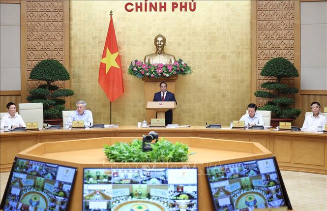 Thủ tướng Phạm Minh Chính chủ trì Phiên họp Chính phủ thường kỳ tháng 3 năm 2026 và Hội nghị Chính phủ trực tuyến với địa phương. Ảnh: Dương Giang-TTXVN 
