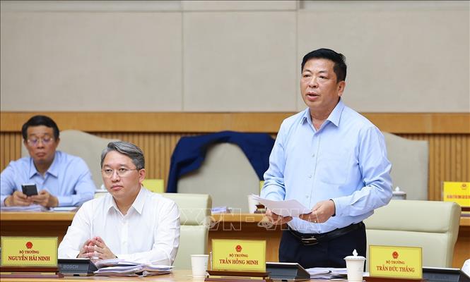 Bộ trưởng Bộ Xây dựng Trần Hồng Minh phát biểu. Ảnh: Dương Giang-TTXVN