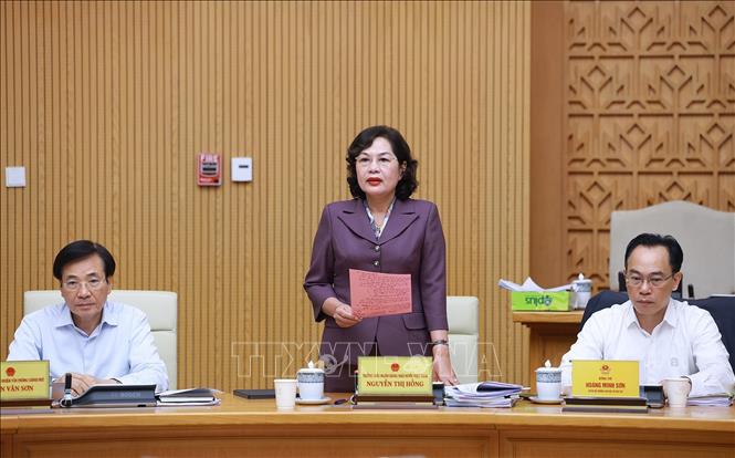Thống đốc Ngân hàng Nhà nước Nguyễn Thị Hồng phát biểu. Ảnh: Dương Giang-TTXVN