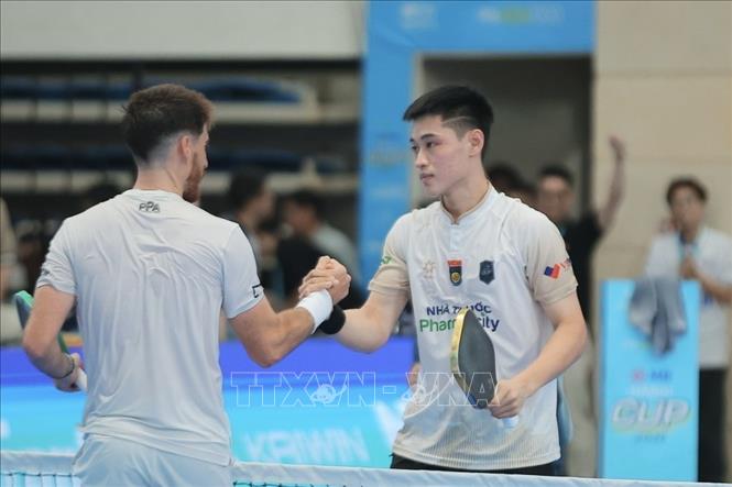 Trương Vinh Hiển có trận đấu xuất sắc khi đánh bại siêu sao Federico Staksrud để giành vé vào chung kết đơn nam chuyên nghiệp. Ảnh: Minh Quyết - TTXVN