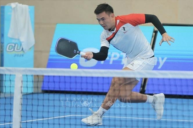 Lý Hoàng Nam đã thể hiện phong độ chói sáng khi đánh bại ngôi sao Dylan Frazier 2-0, giành quyền vào chơi trận chung kết gặp Trương Vinh Hiển. Ảnh: Minh Quyết - TTXVN