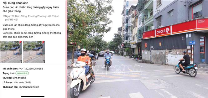 Qua các ứng dụng công nghệ, ngay sau khi nhận được phản ảnh của người dân về tình trạng lấn chiếm lòng đường làm nơi kinh doanh tại khu vực ngõ 120 Định Công, lực lượng Công an phường Phương Liệt đã tiếp nhận và giải quyết triệt để tình trạng trên. Ảnh: Phạm Kiên - TTXVN