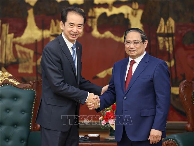 Thủ tướng Phạm Minh Chính tiếp Đại sứ Trung Quốc tại Việt Nam Hà Vĩ. Ảnh: Dương Giang-TTXVN 