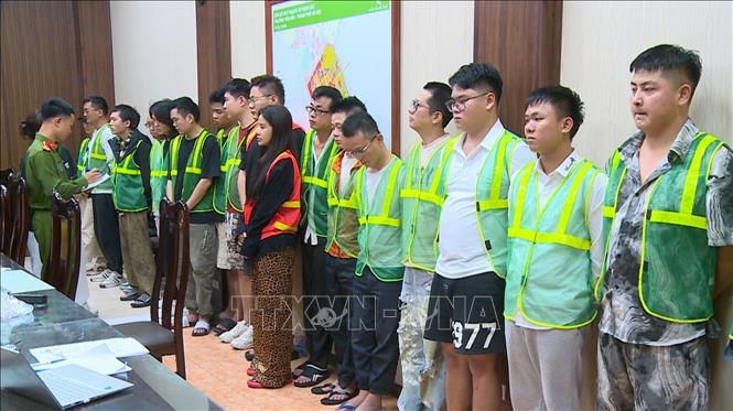 Các đối tượng tại Cơ quan Công an.
Ảnh: TTXVN phát