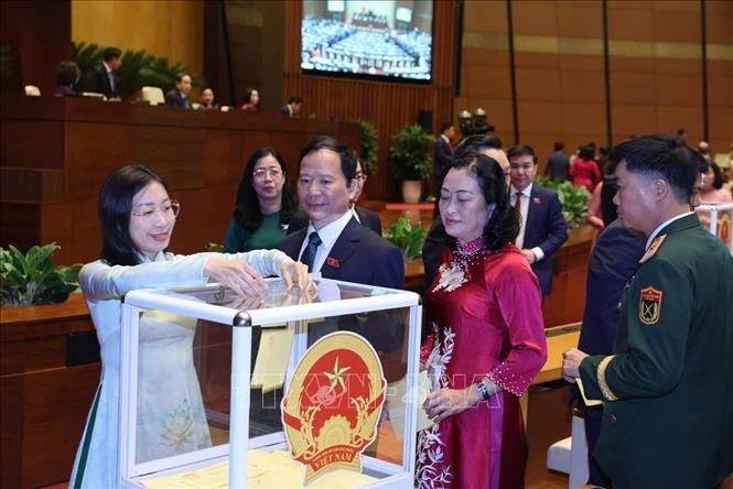 NA deputies cast ballots to elect the State President. VNA Photo