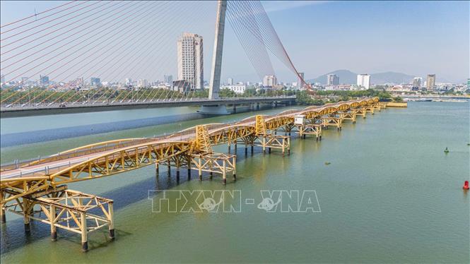 Nguyen Van Troi bridge, which was built in 1965 by the American contractor RMK [RMK-BRJ], is kept with original design and transformed into a walking bridge. VNA Photo: Xuân Quý