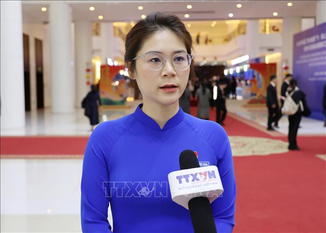 Chị Nguyễn Thị Hương Nhung, Bí thư Tỉnh Đoàn Cao Bằng trả lời phỏng vấn phóng viên TTXVN. Ảnh: Quang Hưng - PV TTXVN tại Trung Quốc