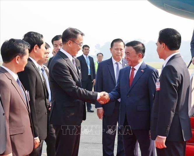 A view of the welcome ceremony at the Wattay International Airport. VNA Photo: Phương Hoa 