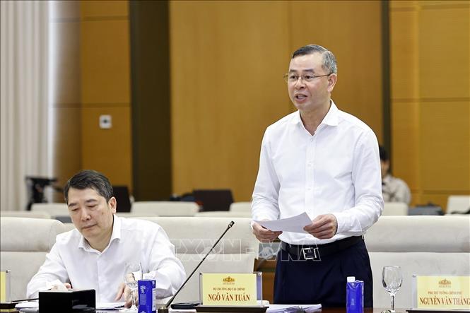 Bộ trưởng Tài chính Ngô Văn Tuấn phát biểu. Ảnh: Doãn Tấn - TTXVN