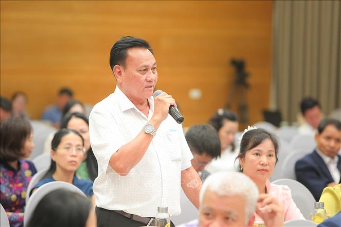 Ông Lưu Văn Diễn, Chủ tịch HĐQT HTX Cơ giới xây dựng Vĩnh Thái chia sẻ và góp ý tại Diễn đàn. Ảnh: Lê Đông - TTXVN